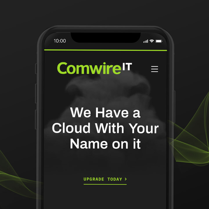 Comwire IT website displayed on mobile device.